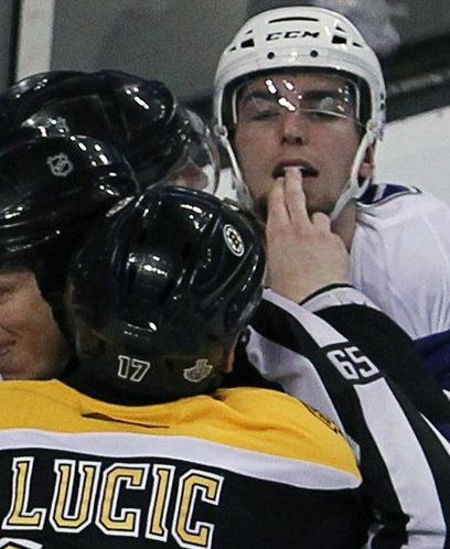  PHOTO Milan Lucic Sticks Finger In Alex Burrows Mouth