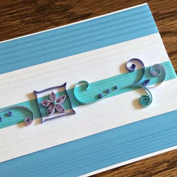 blue and lavender quilled card with corrugated background paper