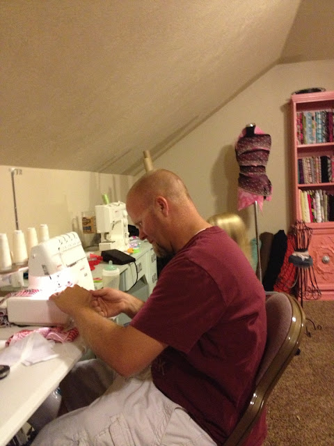 Daddy getting involved in sewing ruffle skirts