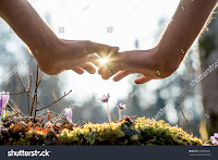 Two hands in spring season 