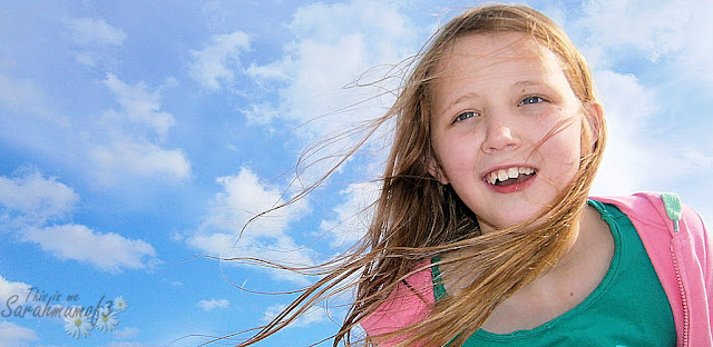 girl outdoors against sky