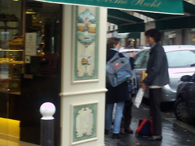 Mother holding french bakery bread