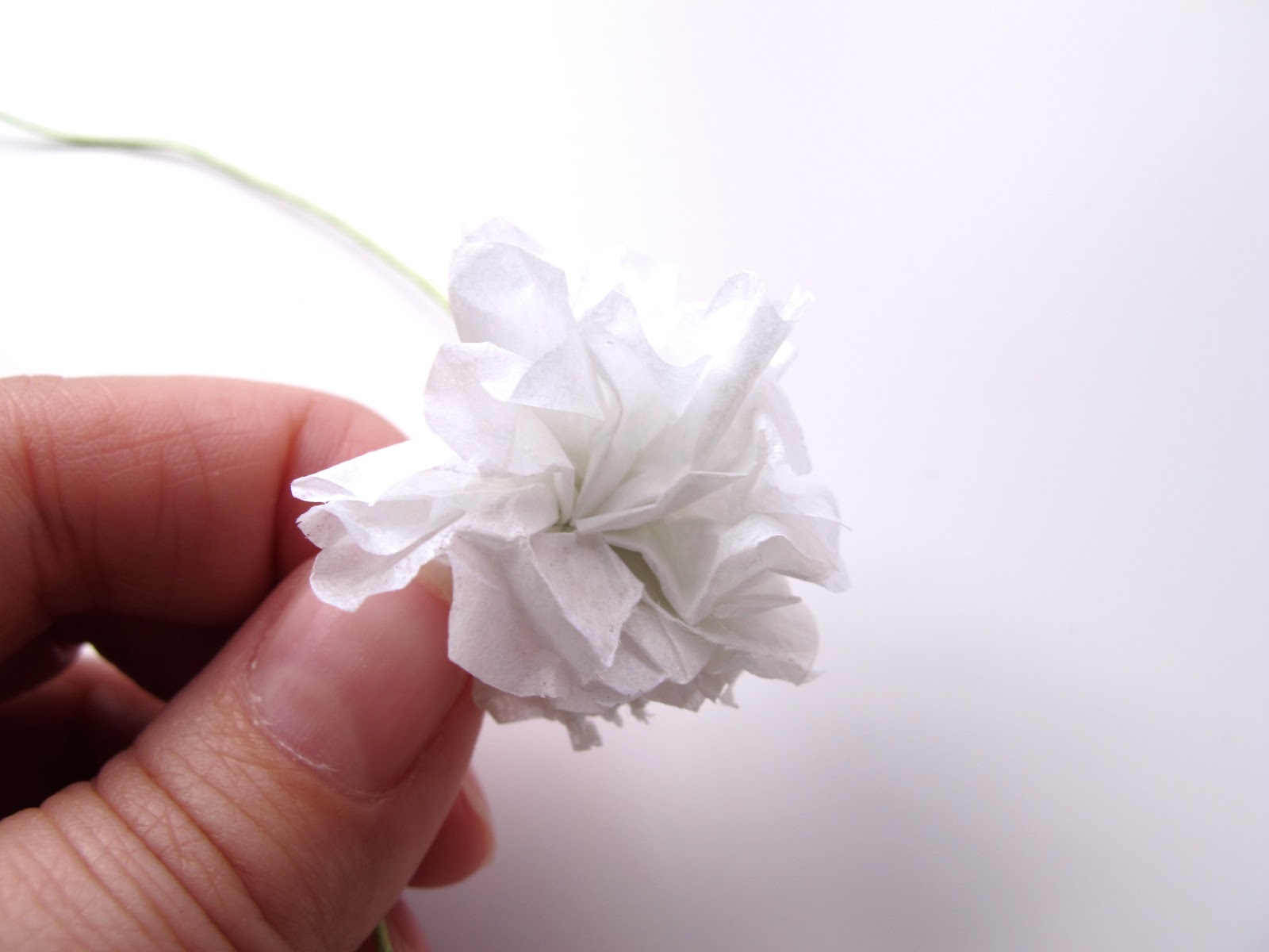 ... & fluffing until your paper resembles a small blossom flower