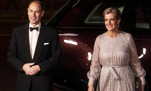 Countess of Wessex wore a new Lindsay pleated lace gown by Erdem. Diamond earrings and crystal clutch bag