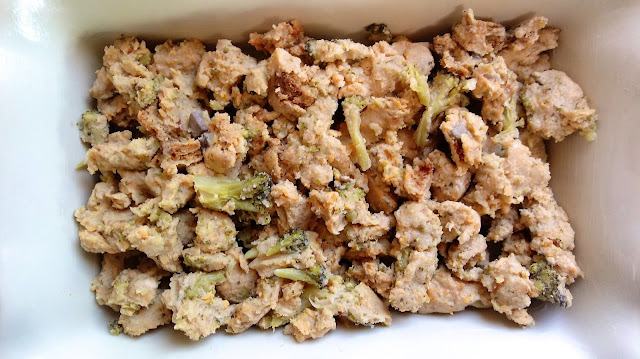 a layer of stuffing in a buttered casserole dish