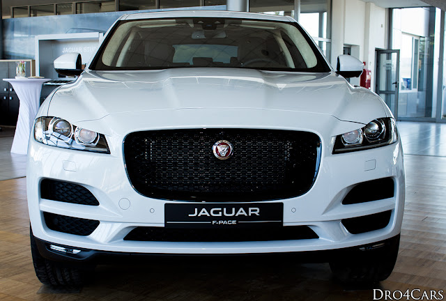 The 2016 Jaguar F-PACE - front view with the front grille and the headlights.