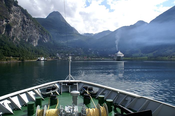 The Geirangerfjorden is a fjord in the Sunnmøre region of Møre og Romsdal county, Norway. It located entirely in Stranda Municipality. It is a 15-kilometre (9.3 mi) long branch off of the Sunnylvsfjorden, which is a branch off of the Storfjorden (Great Fjord). The small village of Geiranger is located at the end of the fjord where the Geirangelva river empties into it.