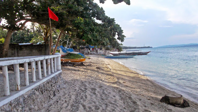 a house beside Francisco Beach Resort and Lodge is illegally built on the water's edge