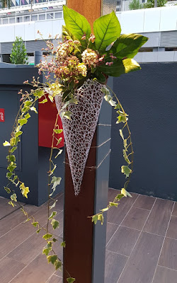 Bloem provided all the flower arrangements for the celebration, including these wall arrangements.