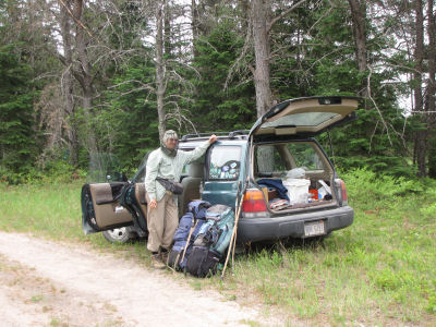 hikers at car