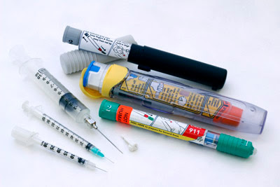 Examples of sharps, including needles and syringes. 