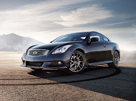 Front 3/4 view of black 2011 Infiniti G37 in desert with tire tracks