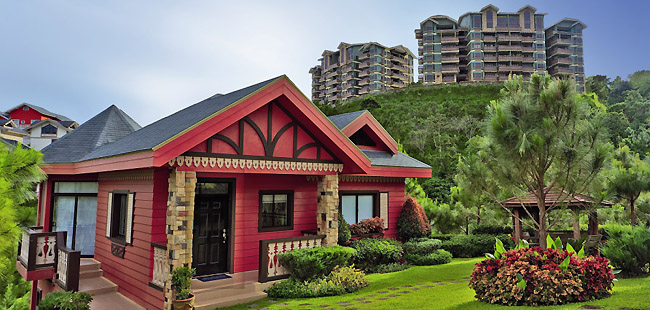 The Swiss Village has low-rise villas in the style of Swiss chalets surrounded by the green pine trees.