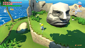 Link standing in front of the stone head rock on the Stone Watcher Island