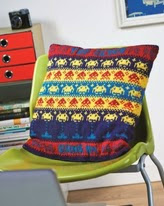 http://www.letsknit.co.uk/free-knitting-patterns/retro-arcade-games-cushion