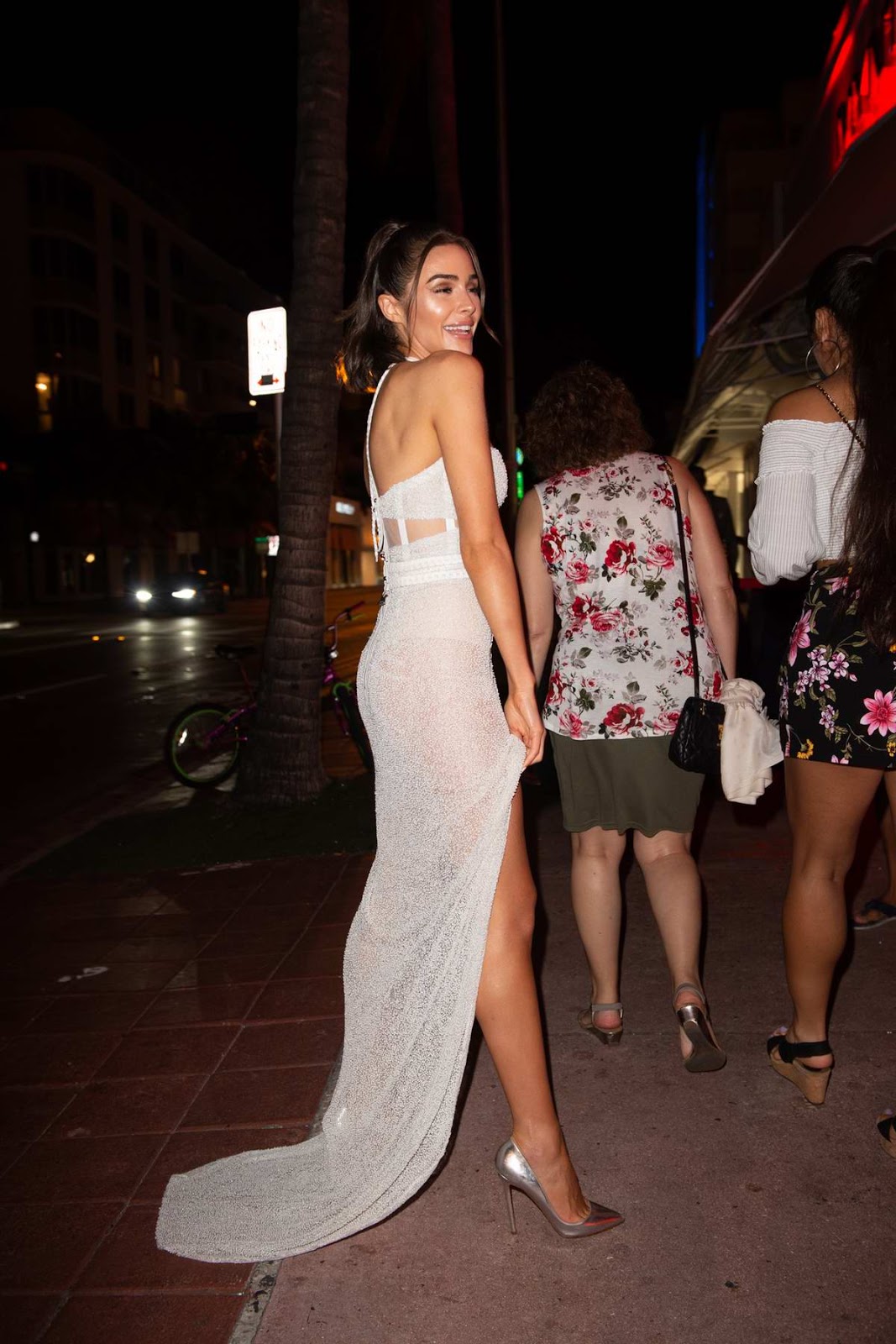 Olivia Culpo night out style outfits in a white gown in Miami Beach