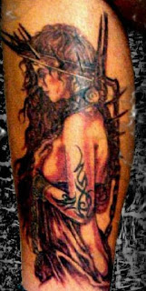 Amazon Slave Girl Tattoo