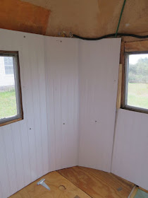 white paneling inside a fiberglass trailer