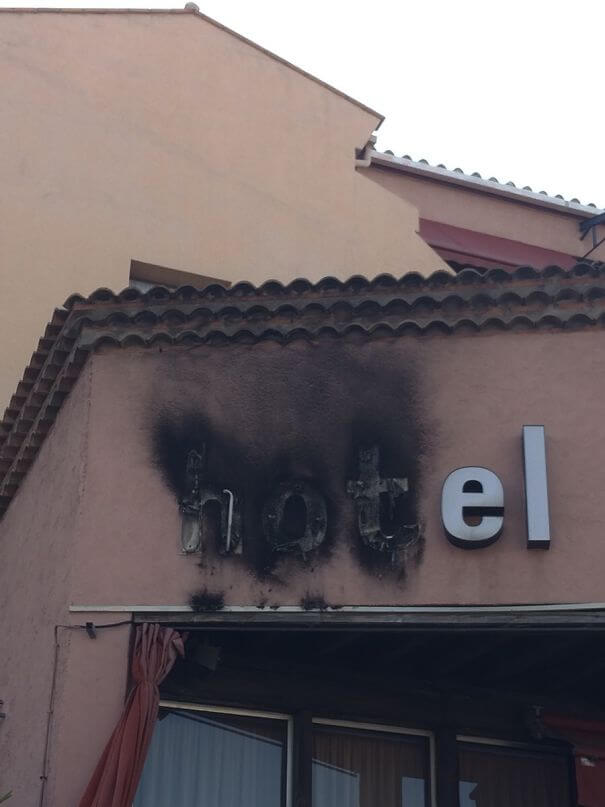 30 Hilarious Hotel Failures That Will Make Your Day - The Word 'Hot' In Hotel Caught On Fire