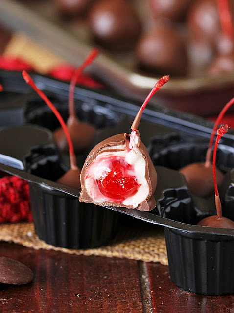 Homemade Chocolate Covered Cherry Cut to Show Inside Image