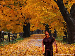 Wallpaper of Vin Diesel Action Movie Actor Wheelman The Movie Poster in Autumn Trees background