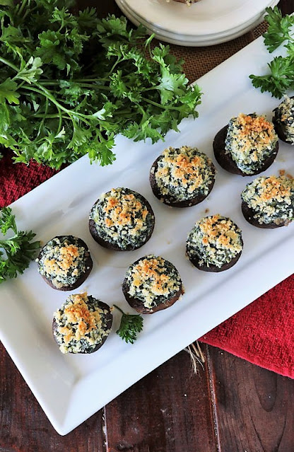 Top View of Spinach Dip Stuffed Mushrooms on Platter Image