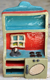 ceramic model of play kitchen