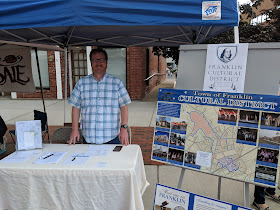 Philip Regan of the Cultural District Committee was at their booth to provide info