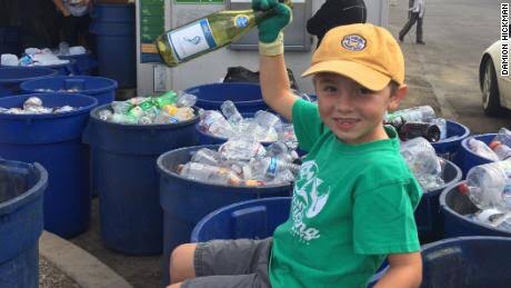 Ryan holding some of his recyclables