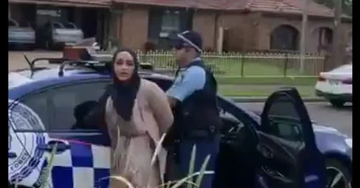Hijab-wearing women spits on a Sydney officer