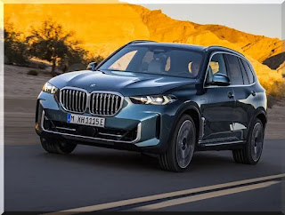 Imagem lateral do BMW X5 2024: Nesta imagem, podemos ver as linhas musculosas e fortes do carro, que transmitem uma sensação de robustez e agilidade. As rodas de liga leve são imponentes e variam de 19 a 22 polegadas.
