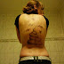 Revenge Story:Boyfriend tattooed a steaming pile of poo girlfriend's back  for Cheating