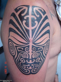 freeman tribal tattoo design in arm