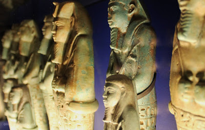 Shabti figures were statuettes, usually in the form of a mummy. The Egyptians believed that these would magically carry out any work they had to do in the afterlife. Often 365 shabti figuresn were placed in a tomb that's one for each day of the year