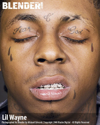 Lil Wayne Face tattoo Fear of God on his eyelids A Cross and The Saints 