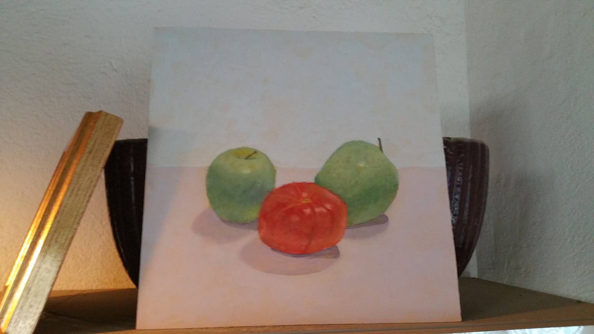 green apples and a tomato