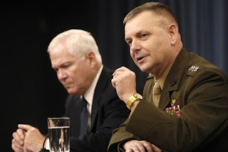 Gen. James E. Cartwright, Robert M. Gates