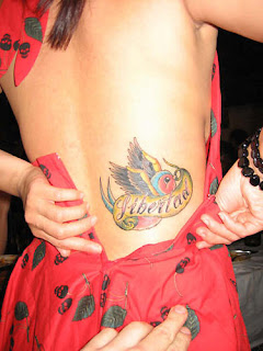 Tattooed Women - Bird Back Tattoo Design