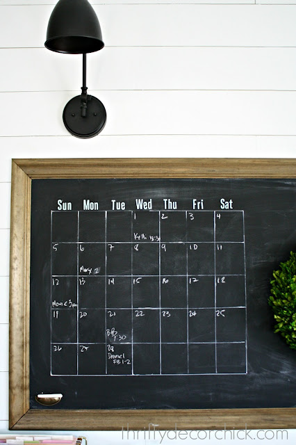 DIY wall calendar on chalkboard wall