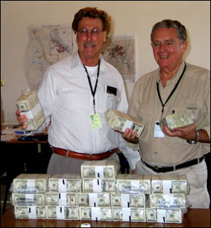 US officials in Iraq pose with shipment of cash