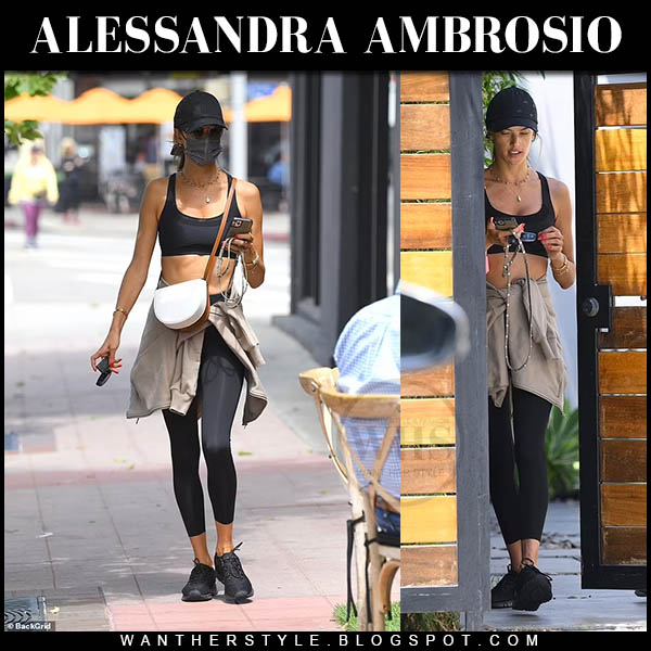 Alessandra Ambrosio in black sports bra, beige hoodie and leggings