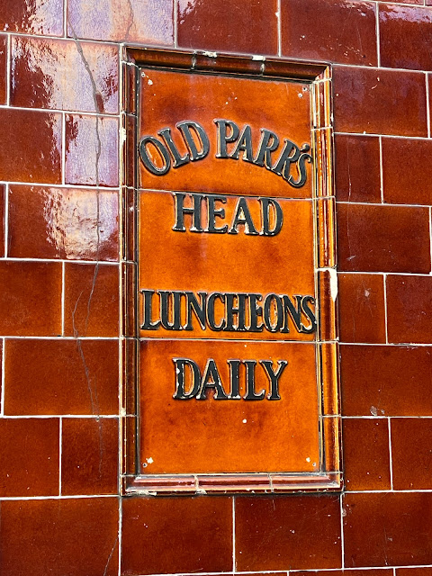 Tiling on the Old Parr's Head pub, Islington, North London, N1