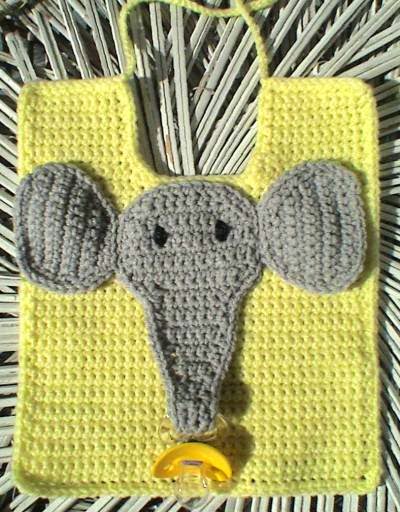 http://crochetcafe.blogspot.com/2005/04/elephant-pacifier-bib.html