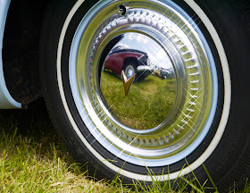 Gleaming wheel hub on a vintage car