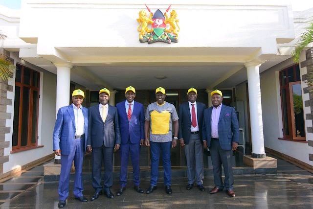 Deputy President William Ruto with top officials resigned for UDA