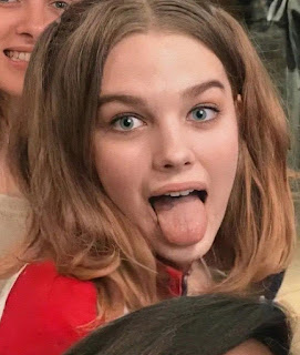 showing her suck-able tongue