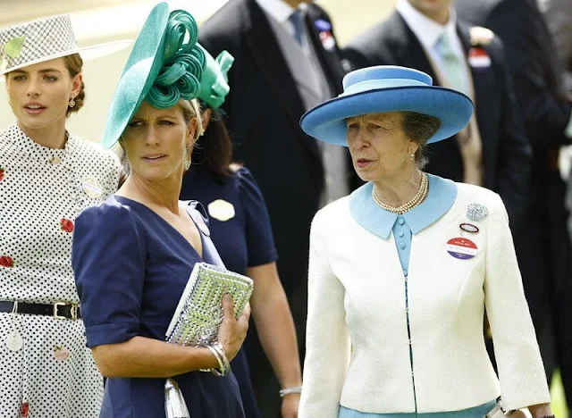 Zara Tindall wore a blue dress by Laura Green. Queen Camilla wore her Anna Valentine pink dress coat. Suzannah Allison dress