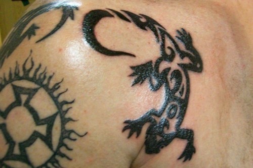 Lizard tattoos, which include iguana tattoos, 