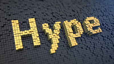 PIc of yellow bricks spelling out the word HYPE against black brick background