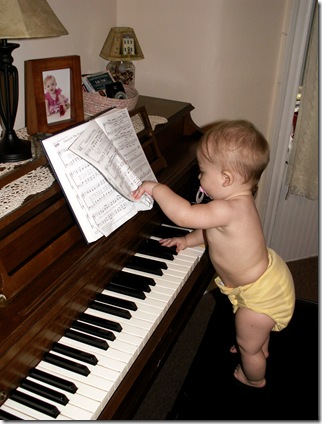 Elaine 8 months playing piano